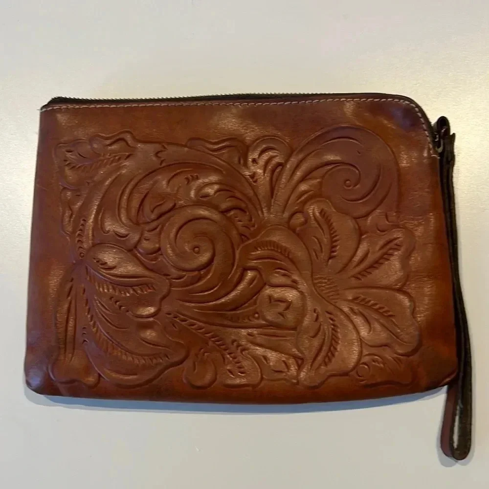 Patricia Nash Cassini Wristlet with tooled floral pattern in Florence Brown
